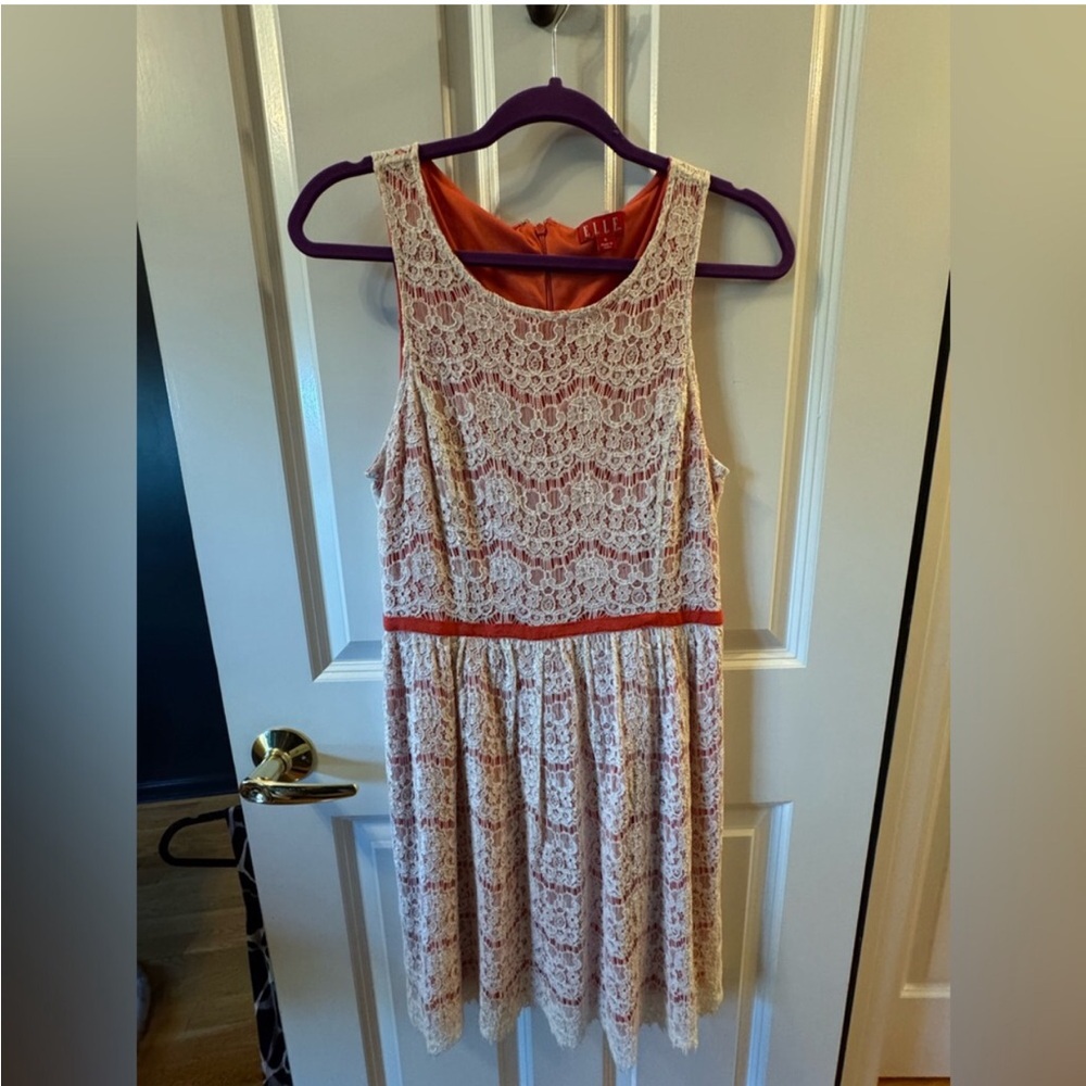 Lace Sleeveless Dress with Red Accents
